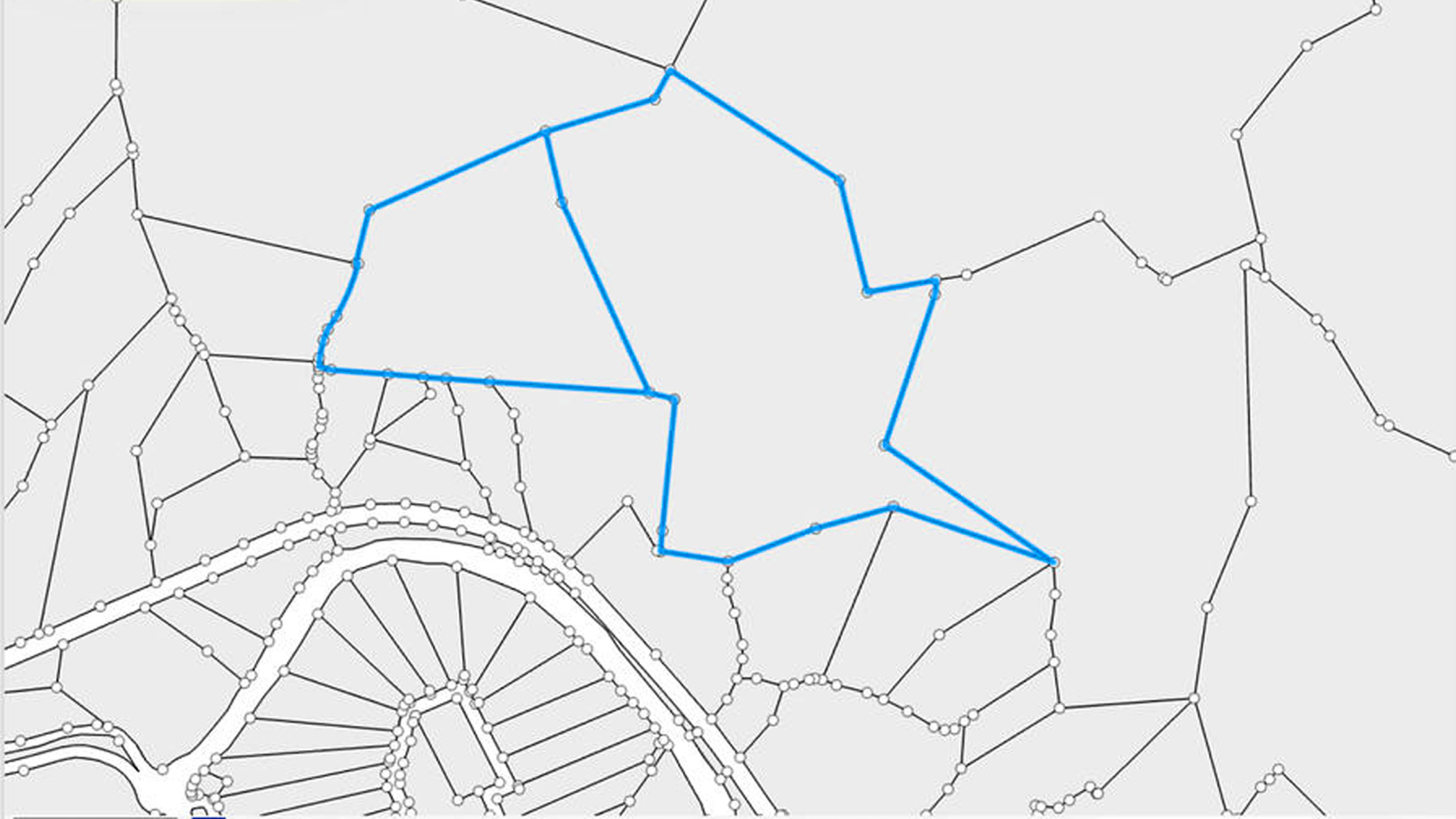 Eine Karte mit einem Netz von Linien und Knotenpunkten, auf der ein großes, unregelmäßiges Polygon blau hervorgehoben ist